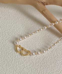 2025 French Style High-End Hollow Heart Pearl Choker Necklace - Short, Niche Design for Elegant Fashion