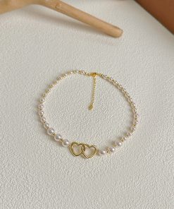 2025 French Style High-End Hollow Heart Pearl Choker Necklace - Short, Niche Design for Elegant Fashion