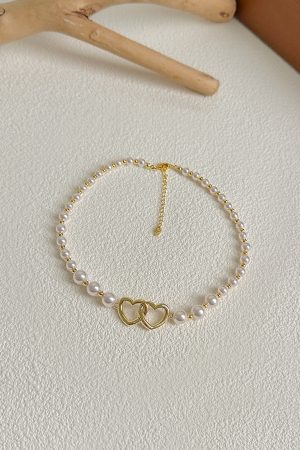 2025 French Style High-End Hollow Heart Pearl Choker Necklace - Short, Niche Design for Elegant Fashion