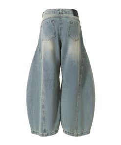 American Vintage Ripped Wide-Leg Jeans with Double Side Seam and Curved Silhouette - Retro 90s Style Denim Trousers