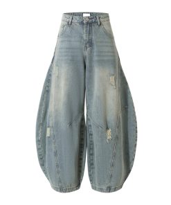 American Vintage Ripped Wide-Leg Jeans with Double Side Seam and Curved Silhouette - Retro 90s Style Denim Trousers