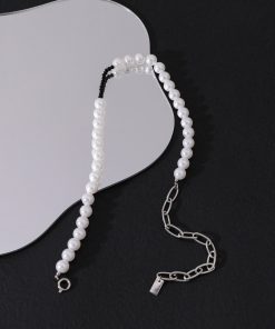 Asymmetric Pearl Splicing Necklace for Women - High-End Black Bead Clavicle Chain, Floating Design, Color Retention, Elegant Accessories