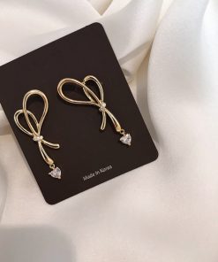 Asymmetrical Love Heart Bow Earrings - High-End Korean Style Light Luxury Ear Studs for Women