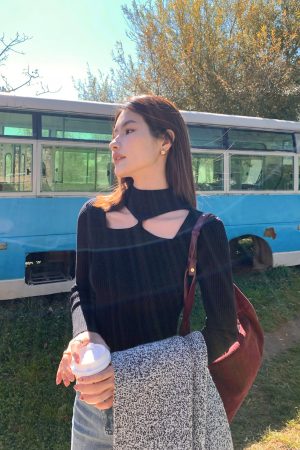Black Hollow Knit Sweater for Women - Slim Fit Long Sleeve Top, Trendy Niche Design, Perfect for 90s and Y2K Style.