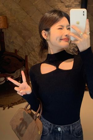 Black Hollow Knit Sweater for Women - Slim Fit Long Sleeve Top, Trendy Niche Design, Perfect for 90s and Y2K Style.
