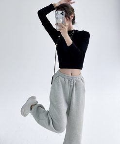 Black Long Sleeve High-Waisted Crop Top - Slim Fit Midriff-Baring T-Shirt for Spring 2025 - Korean Style Sexy Fashion