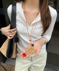 Bohemian Ethnic Heart Hollow Pendant Necklace for Women, Long Clavicle Chain, Versatile Niche Design Accessory