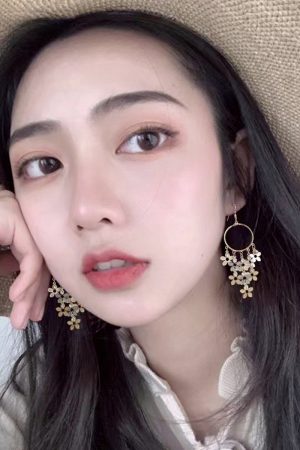 Bohemian Floral Tassel Earrings for Women - Exaggerated Forest-Style Ethnic Accessories, Unique Mosquito Coil Plate Ear Clips