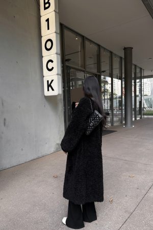 Chic Long Wool and Leather Integrated Coat - High-End 2025 Design with Practical Hanging Style and Soft Granule Feel
