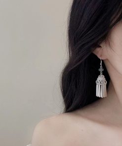 Chinese-Style Ethnic Miao Tassel Earrings for Women - Niche High-End Light Luxury Fashion Accessories for Travel and Photography