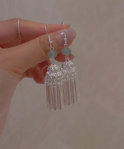 Chinese-Style Ethnic Miao Tassel Earrings for Women - Niche High-End Light Luxury Fashion Accessories for Travel and Photography