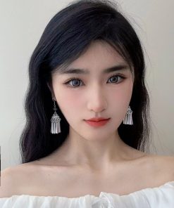 Chinese-Style Ethnic Miao Tassel Earrings for Women - Niche High-End Light Luxury Fashion Accessories for Travel and Photography