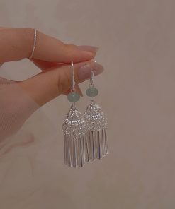Chinese-Style Ethnic Miao Tassel Earrings for Women - Niche High-End Light Luxury Fashion Accessories for Travel and Photography
