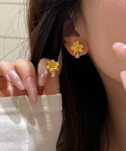 Chinese-Style Gold Brushed Lily Flower Water Drop Tassel Earrings - Elegant High-End Niche Studs for Women