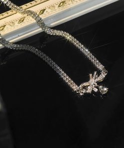 Double-Layer Bow Heart Pendant Claw Chain Necklace - Elegant Short Fashion Collarbone Chain for Chic Style