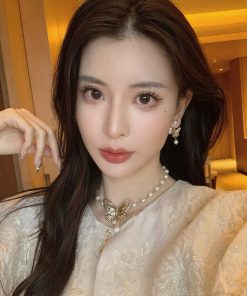 Elegant Butterfly Dream Non-Metal Imitation Pearl Necklace with White Beads - Niche Fashion Jewelry for Chic Styles