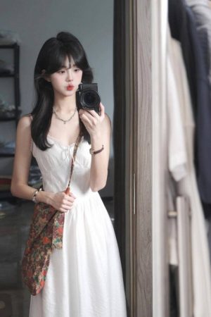 Elegant White Spaghetti Strap Dress with Fairy Waist-Cinching, Slim-Fitting Design - Summer Vacation Style in French-Inspired Fashion