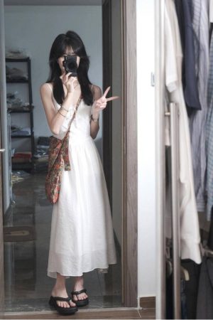 Elegant White Spaghetti Strap Dress with Fairy Waist-Cinching, Slim-Fitting Design - Summer Vacation Style in French-Inspired Fashion