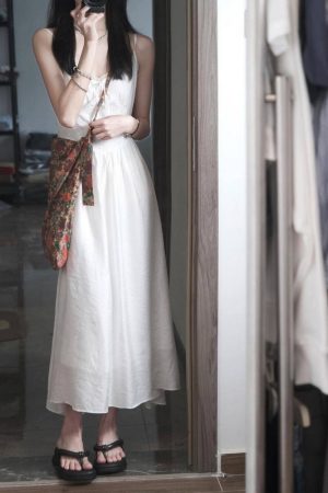 Elegant White Spaghetti Strap Dress with Fairy Waist-Cinching, Slim-Fitting Design - Summer Vacation Style in French-Inspired Fashion