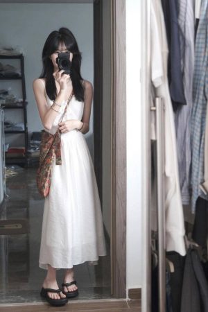 Elegant White Spaghetti Strap Dress with Fairy Waist-Cinching, Slim-Fitting Design - Summer Vacation Style in French-Inspired Fashion