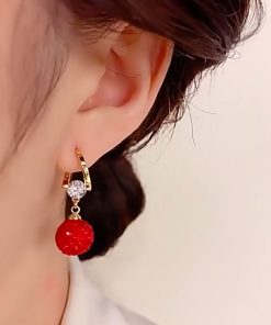Elegant Women's Red Pomegranate Cubic Zirconia Ear Clips - Unique Light Luxury Fashion Earrings for Autumn Winter Style