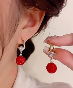 Elegant Women's Red Pomegranate Cubic Zirconia Ear Clips - Unique Light Luxury Fashion Earrings for Autumn Winter Style