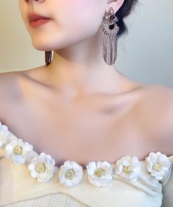 Exaggerated Vintage Tassel Earrings with Antique Bronze and Crystal Inlay â€“ Elegant Face-Slimming Design for 2025 Fashion Trends