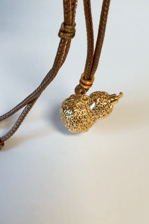 Exquisite Hollow Gourd Braided Rope Necklace - Ancient Method Sand Gold High-End Sweater Chain for Elegant Style
