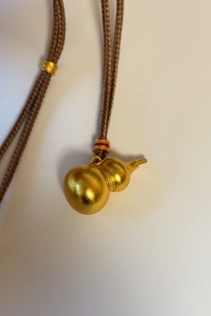 Exquisite Hollow Gourd Braided Rope Necklace - Ancient Method Sand Gold High-End Sweater Chain for Elegant Style