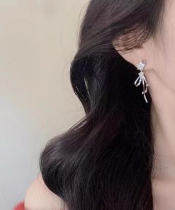 Exquisite Long Star Bow Earrings - Minimalist High-End Studs for a Slimmer Face, Fashionable and Chic Statement Jewelry