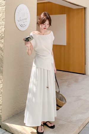 French Irregular Top and High-Waisted Skirt Two-Piece Set for Women â€“ Stylish Summer 2025 Fashion