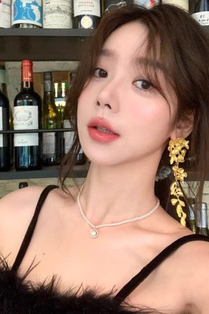 French Retro Heavy Metal Flower Tassel Earrings for Women â€“ High-End Unique Studs, Autumn & Winter Fashion Jewelry
