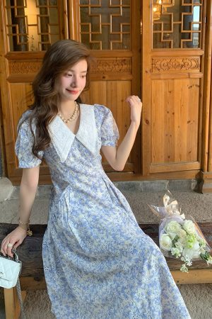 French-Style Floral Dress with Doll Collar and Waist-Cinching Design for Women - Elegant Summer Seaside Vacation Long Skirt