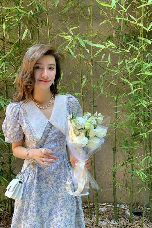 French-Style Floral Dress with Doll Collar and Waist-Cinching Design for Women - Elegant Summer Seaside Vacation Long Skirt