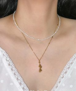 French-style Light Luxury Women's Necklace with Floating Metal Clavicle Chain and Small Ball Design