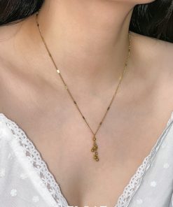 French-style Light Luxury Women's Necklace with Floating Metal Clavicle Chain and Small Ball Design