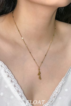 French-style Light Luxury Women's Necklace with Floating Metal Clavicle Chain and Small Ball Design