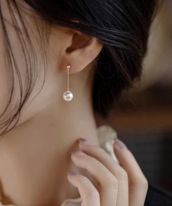 French-Style Long Tassel Pearl Earrings - Niche High-End Stud Accessories for 2025 Fashion Trends