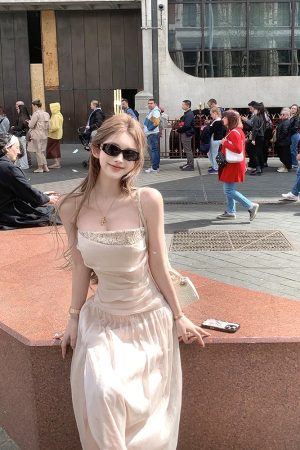 French-Style Pleated Split Dress for Women - Elegant Summer Vacation Long Skirt with High-End Feel, Perfect for 90s and Y2K Fashion.