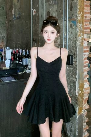 French-Style Sexy Black Spaghetti Strap Dress for Women â€“ Fitted Waist, Slim Short Skirt, Perfect for Summer Fashion