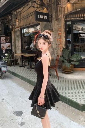 French-Style Sexy Black Spaghetti Strap Dress for Women â€“ Fitted Waist, Slim Short Skirt, Perfect for Summer Fashion