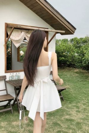 French-Style White Spaghetti Strap Dress for Women with Bow Detail, Fitted Waist, Sweet Temperament, Perfect for Summer
