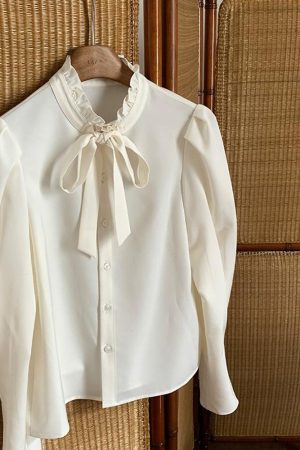 French Vintage Bow Tie Long Sleeve Shirt for Women - Unique Stylish Top for Early Spring Fashion