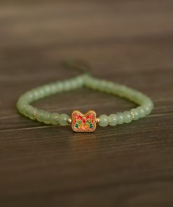 Handmade Beaded Glass Phone Lanyard with Gold Beast Design - Short Anti-Lost Wrist Strap Accessory for Mobile Phones