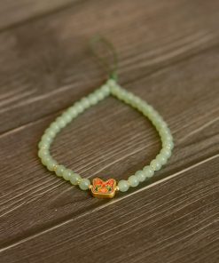 Handmade Beaded Glass Phone Lanyard with Gold Beast Design - Short Anti-Lost Wrist Strap Accessory for Mobile Phones