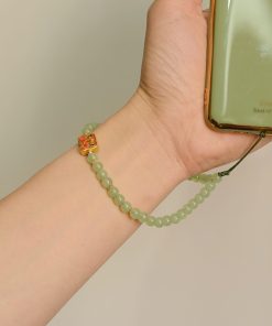 Handmade Beaded Glass Phone Lanyard with Gold Beast Design - Short Anti-Lost Wrist Strap Accessory for Mobile Phones