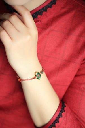Handmade Chinese Style Natural Jadeite Ruyi Bracelet with Pure Silver and Red Rope â€“ Retro Gift for Women