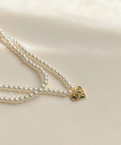 High-End Double-Layer Pearl Necklace with Heart Pendant - Exquisite French Style Clavicle Chain for Elegant Fashion