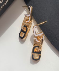 High-End Geometric Oval Linked Black and White Enamel Drip Glaze Diamond-Inlaid Gold-Plated Earrings for Elegant Style