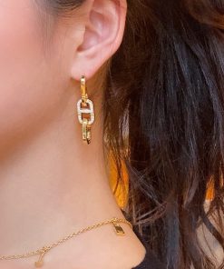 High-End Geometric Oval Linked Black and White Enamel Drip Glaze Diamond-Inlaid Gold-Plated Earrings for Elegant Style